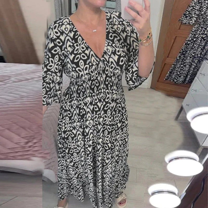 Printed Dress worn by model, front view, black and white pattern, V-neck, wide sleeves, summer style
