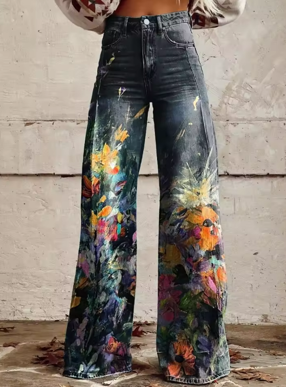 Front view of wide leg high waist boho vintage pants with colourful floral paint splatter design