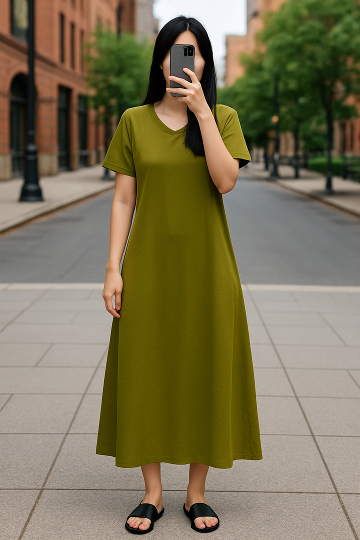 Front view, worn by model, of a flowing maxi dress in olive green with a V neck and short sleeves