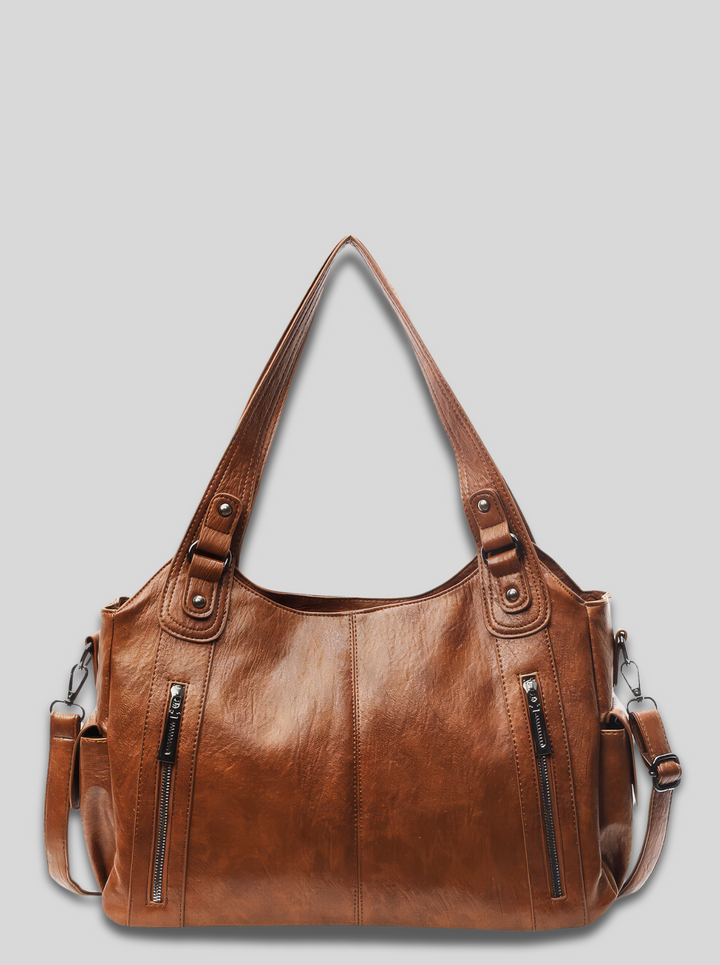 Front view of the Grace Everyday City Bag in dark brown vegan leather with two shoulder straps and side pockets