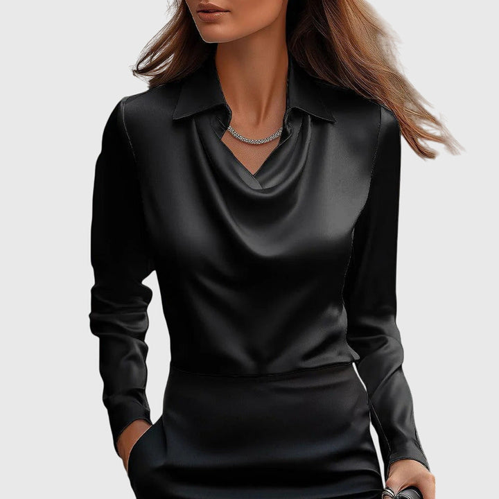 Front view of a model wearing the Autumn Satin Vintage Long Sleeve Blouse in black with a silver necklace