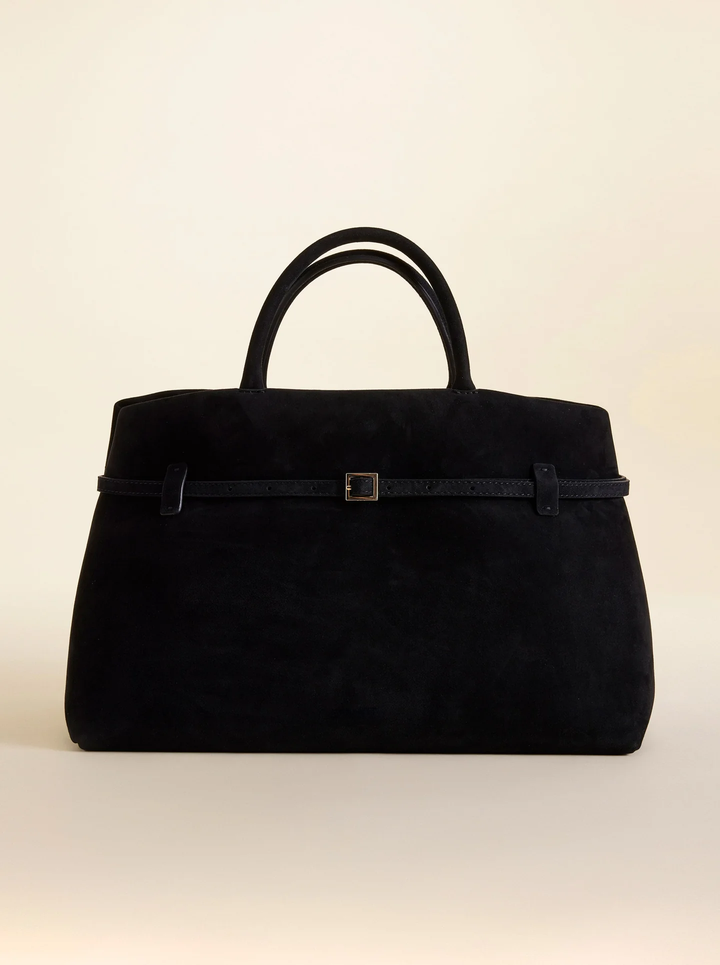 Diana Suede Handbag detail, showing the thin strap with a gold buckle on the dark brown suede