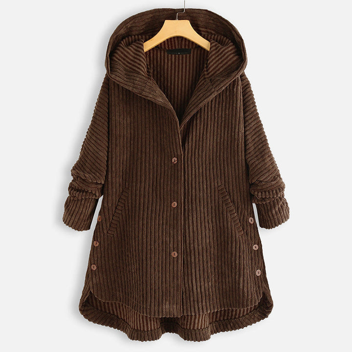 Front view of a brown corduroy hooded button-up coat with pockets, rolled cuffs and side buttons on a hanger