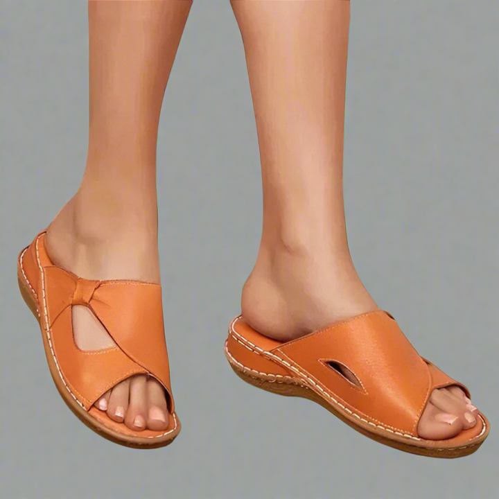Vera premium leather arch support sandals, worn by model, showing the front and side view of the right foot