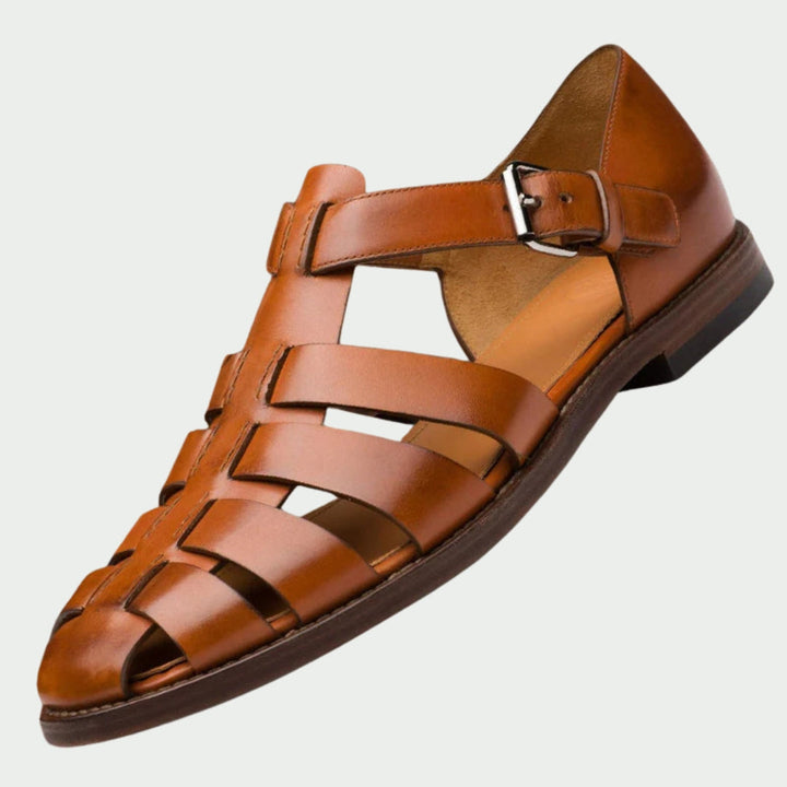 Three quarter view of a single tan leather men&