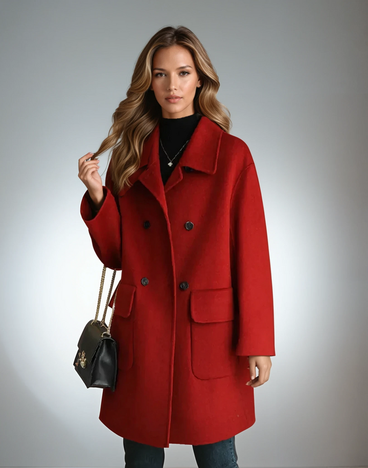Chic & Cosy Coat, front view worn by model, with a silver necklace and black handbag