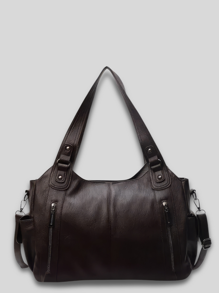 Front view of the Grace Everyday City Bag in dark brown vegan leather with two shoulder straps and front zip pockets