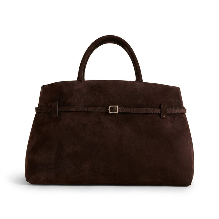 Front view of the Diana Suede Handbag in dark brown, featuring a thin strap with a silver buckle detail