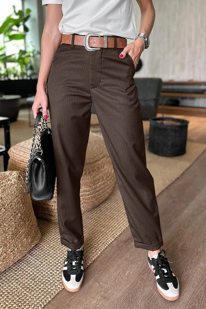 High-Waist Straight Jeans, worn by model, in dark brown pinstripe with cuffed hem and tan belt