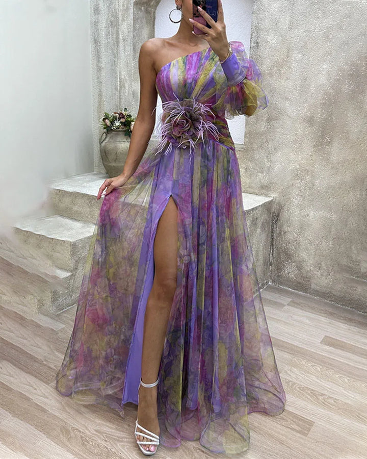 Front view, elegant floral dress with one puffy sleeve, high leg split, and feather waist detail, worn by model