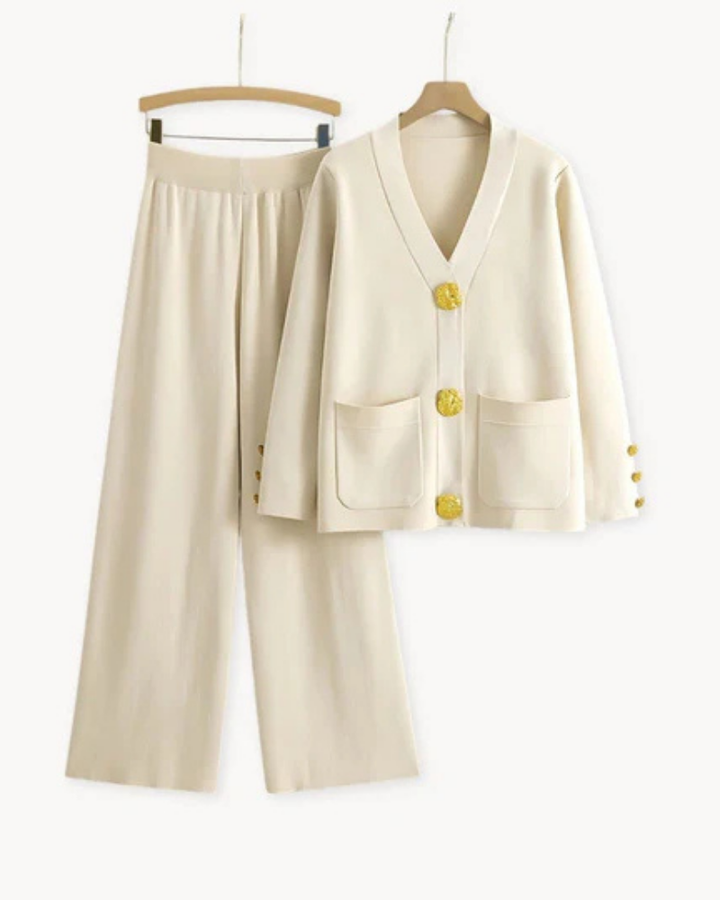 Front view of a luxurious knitwear set with a cream cardigan and matching wide leg trousers