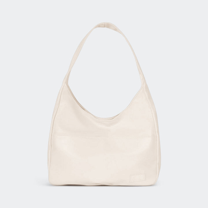 Front view of a cream PU leather shoulder bag with a single strap and a subtle front pocket
