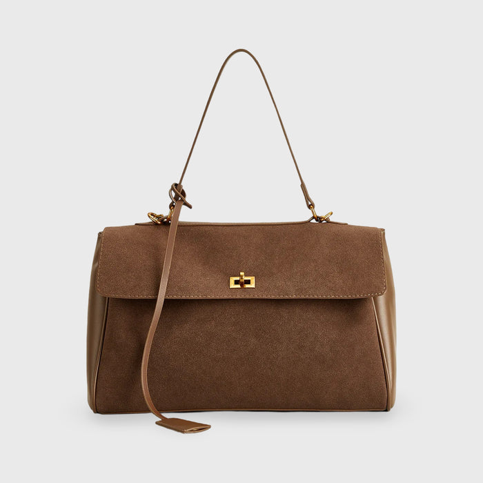 Front view of a brown vegan leather and suede women&