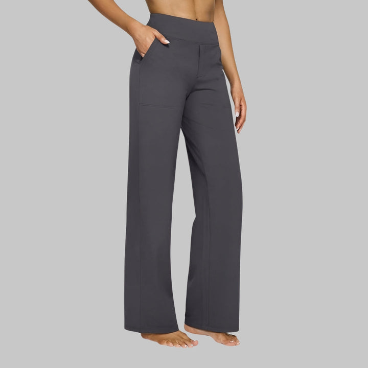 Beverly comfortable stretch pants, three quarter side view worn by model, hand in pocket, wide leg design