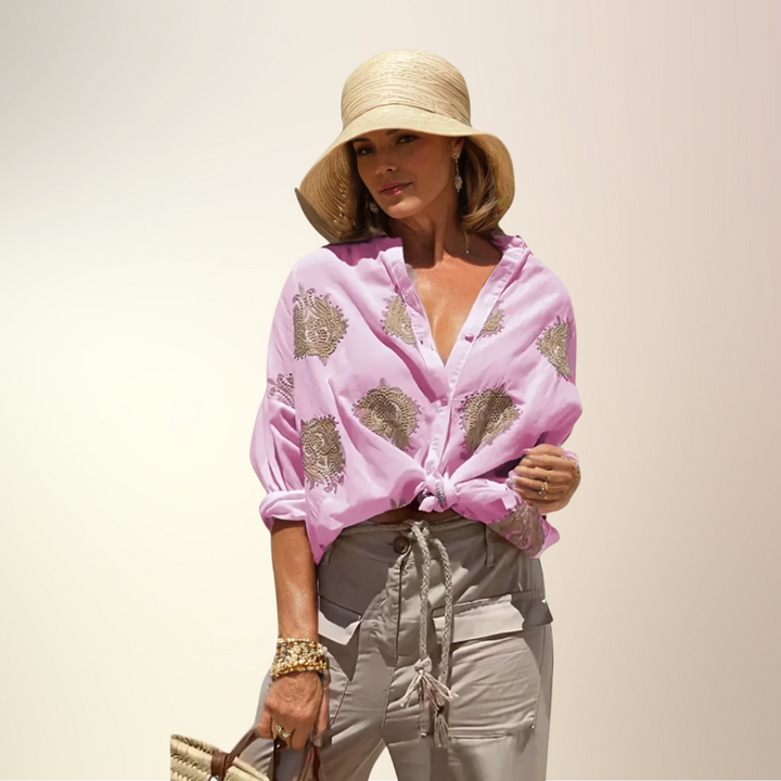 Front view of a model wearing a light and chic pink women&