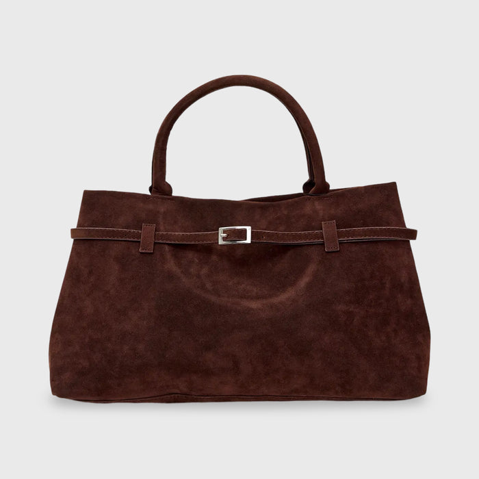 Front view of the brown suede Sara handbag with two top handles and a silver buckle detail