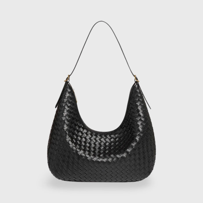 Woven mini handbag, dark brown vegan leather, with a thin shoulder strap and curved base
