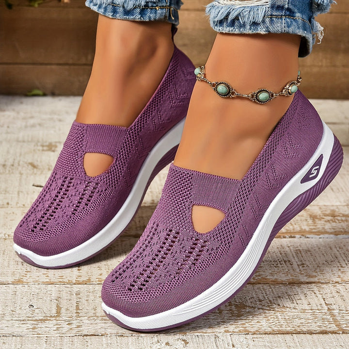 Worn by model, a pair of purple women&
