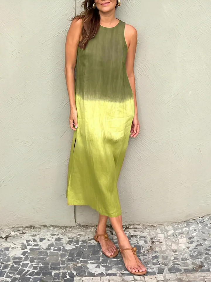 Willa Printed Dress worn by model, a sleeveless midi dress with a dark olive green to light lime green ombre print and