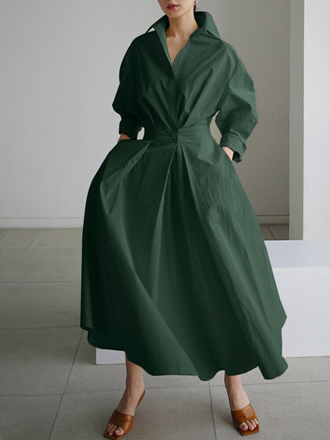 Dark green flowy maxi dress with a single button front, worn by model