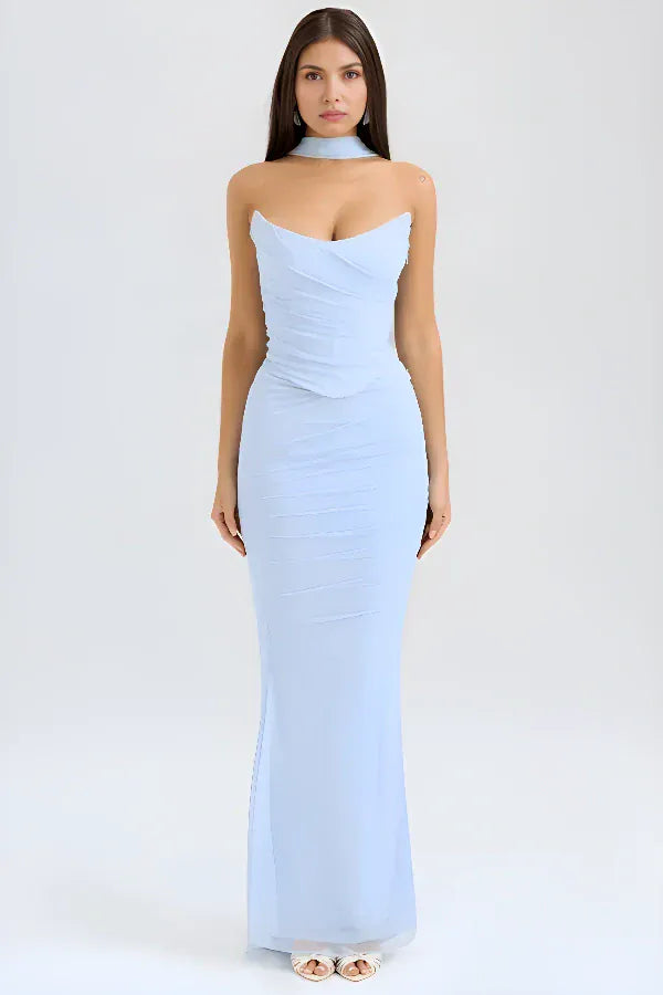 Front view worn by model, a light blue strapless maxi dress with a sweetheart neckline and ruched bodice