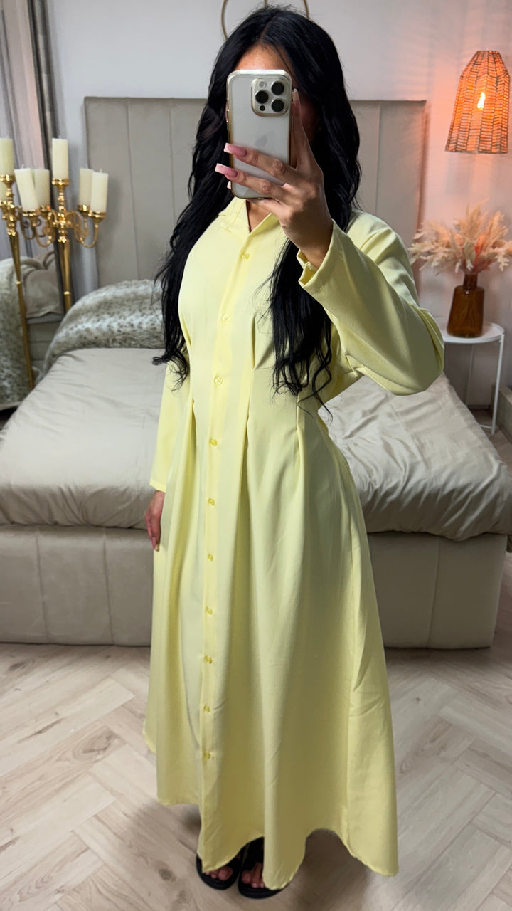Front view of a model in a light yellow women&