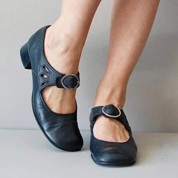 Dark blue orthopaedic leather shoes with a buckle strap and cutout detail