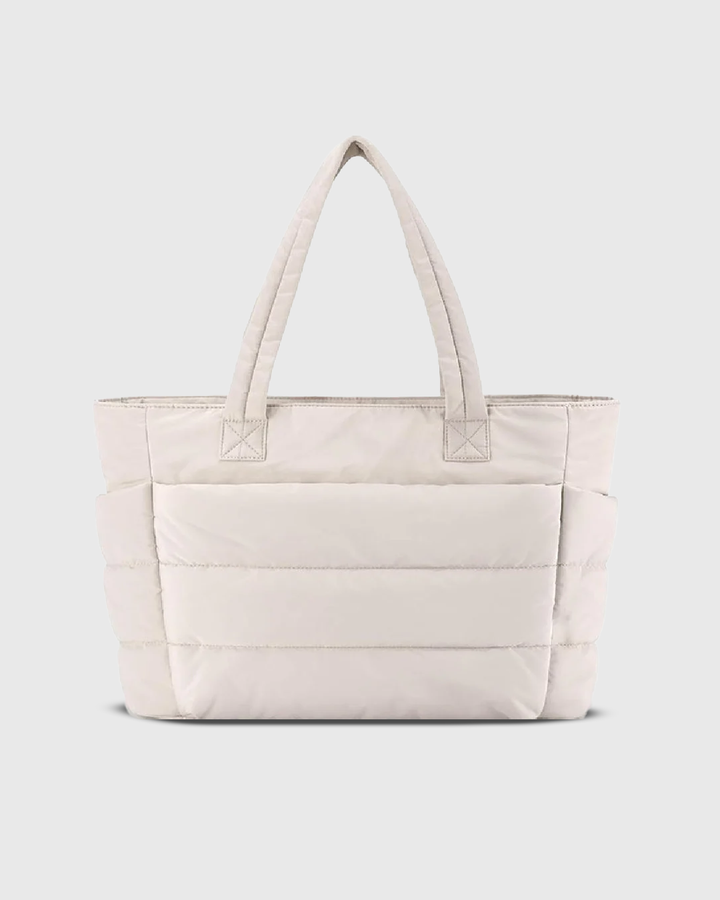 Front view of the cream Cloud Shoulder Bag with a spacious, organised design and side pockets