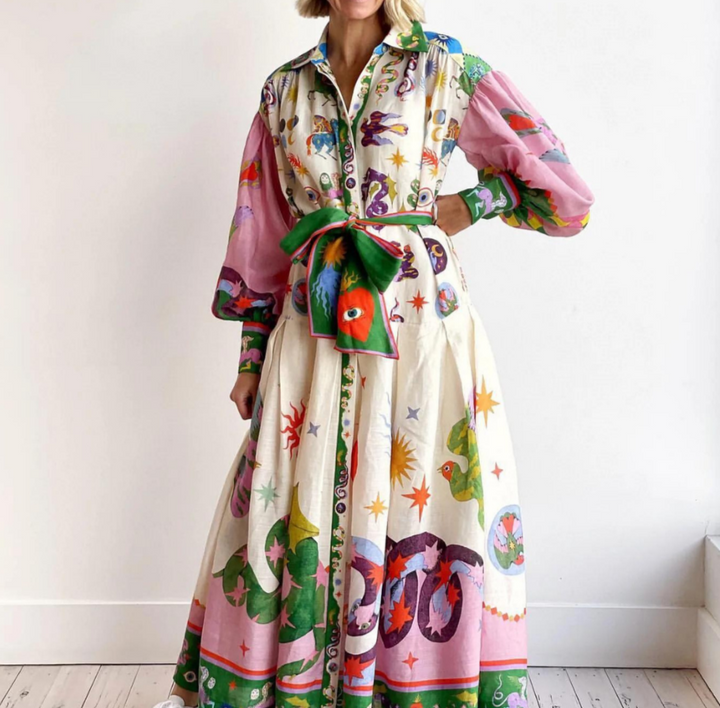 Cream maxi dress with volume and a colourful print, front view