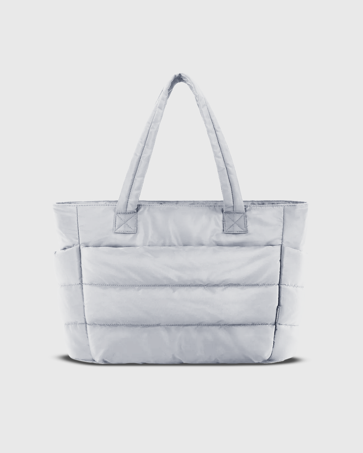Back view of the cream Cloud Shoulder Bag with a spacious, organised design and side pockets