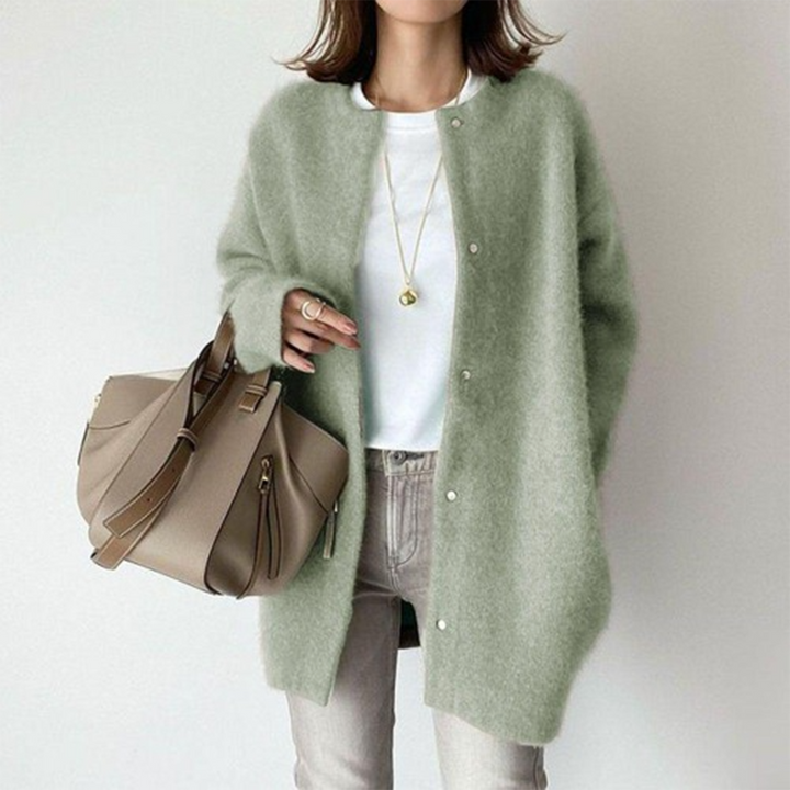 Front view of a model wearing a light green women&