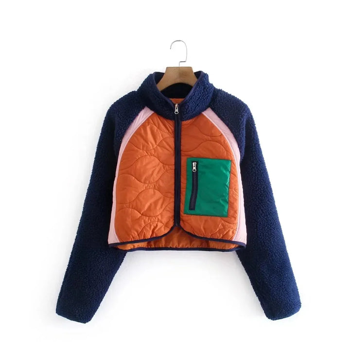 Front view of a patchwork slim fit cotton padded jacket with orange, navy, pink and green panels