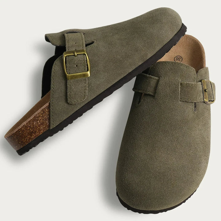 Pair of khaki green Aaron slip-on sandals, suede upper, bronze buckles, cork footbed, flat lay