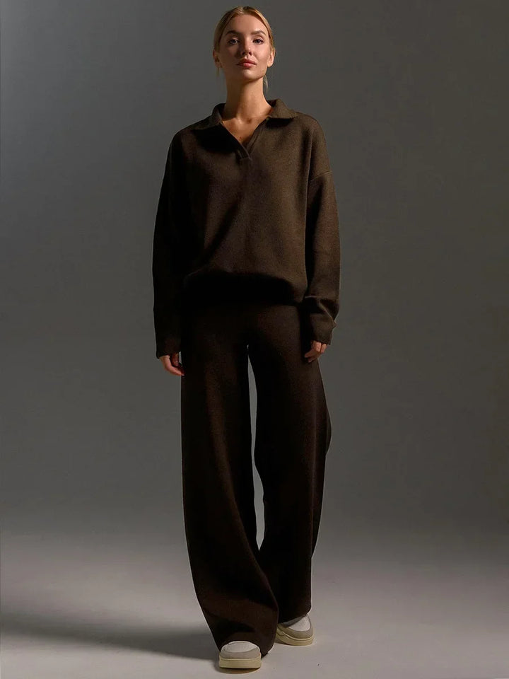 Front view of a model in a brown cozy knitted two-piece set, with a polo neck sweater and wide-leg pants