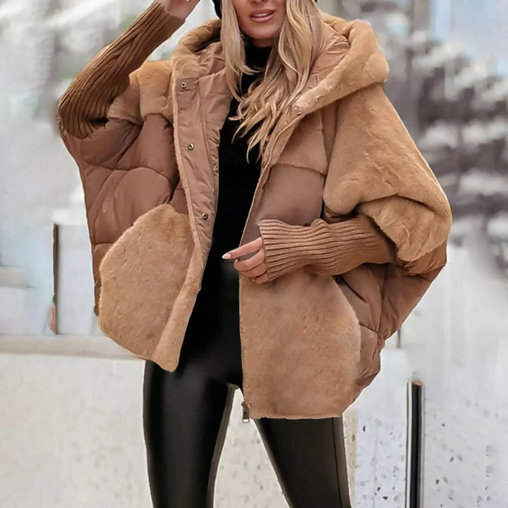 Vera Faux Fur Hooded Winter Parka, front close up worn by model, showing faux fur pockets and ribbed cuffs, alternate angle