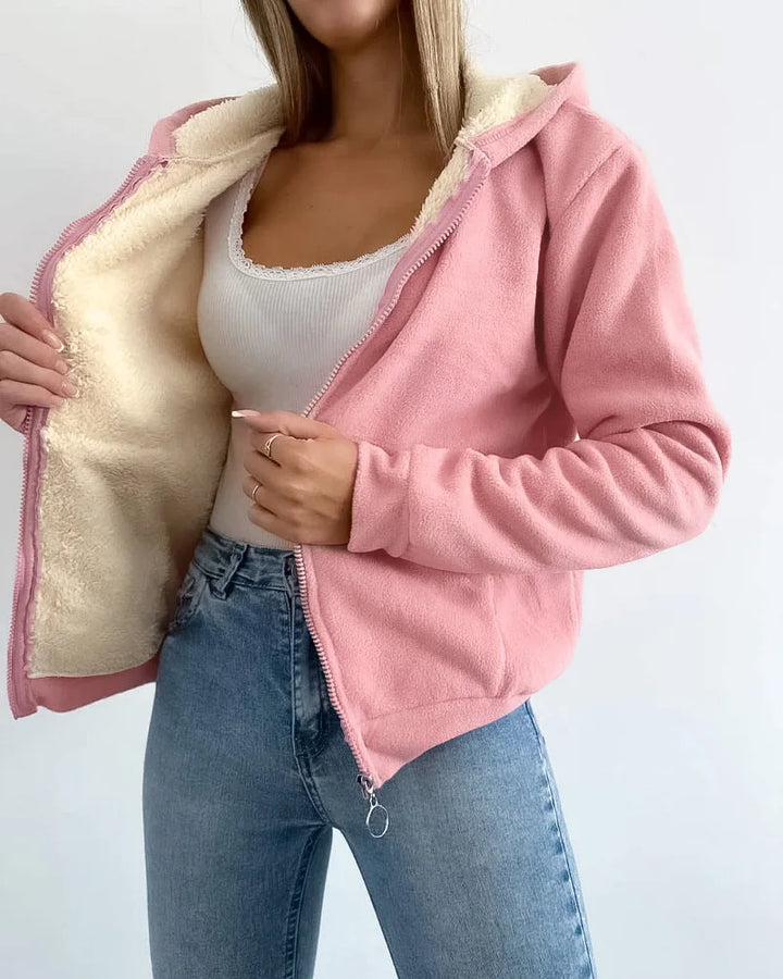 Close up front view, Talia thermal lined zip-up hooded cardigan in light pink showing cream thermal lining