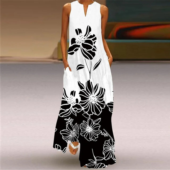 Front view worn by model, Butterfly Bloom A-Line Dress with a black and white floral print and pockets