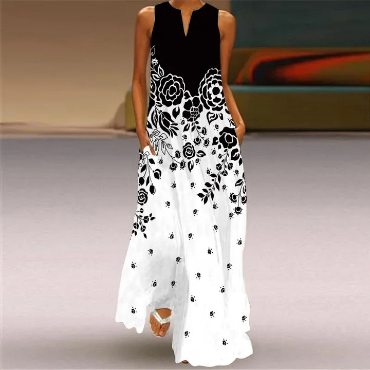 Front view worn by model, Butterfly Bloom A-Line Dress with black and white floral print and pockets