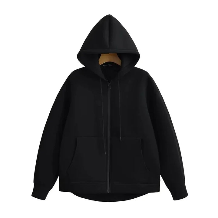 Front view of a black oversized full zip hoodie on a hanger, hood up and pockets visible