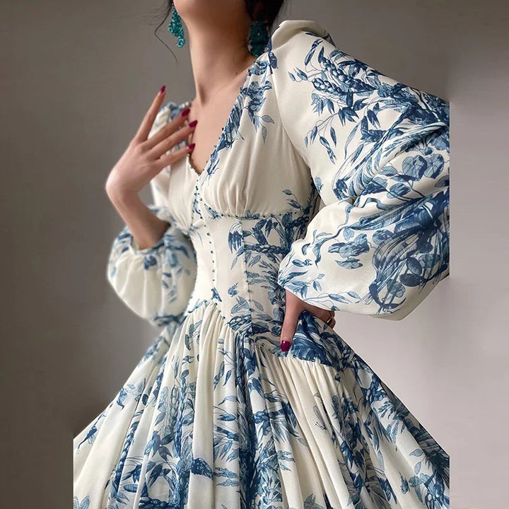 White and blue floral chiffon dress with lantern sleeves, side view