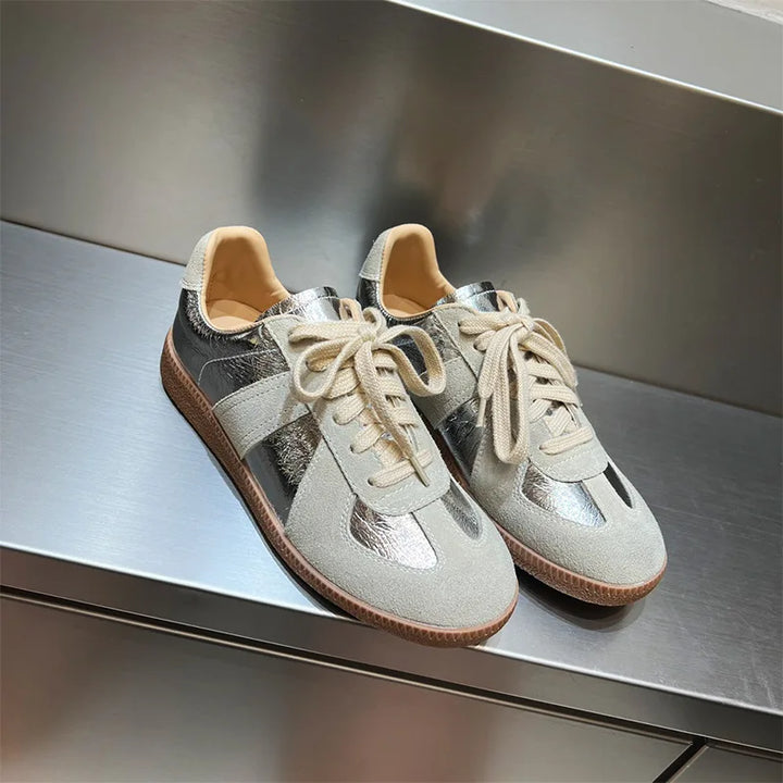 Pair of Nova genuine leather sneakers in light purple with metallic silver accents and tan soles