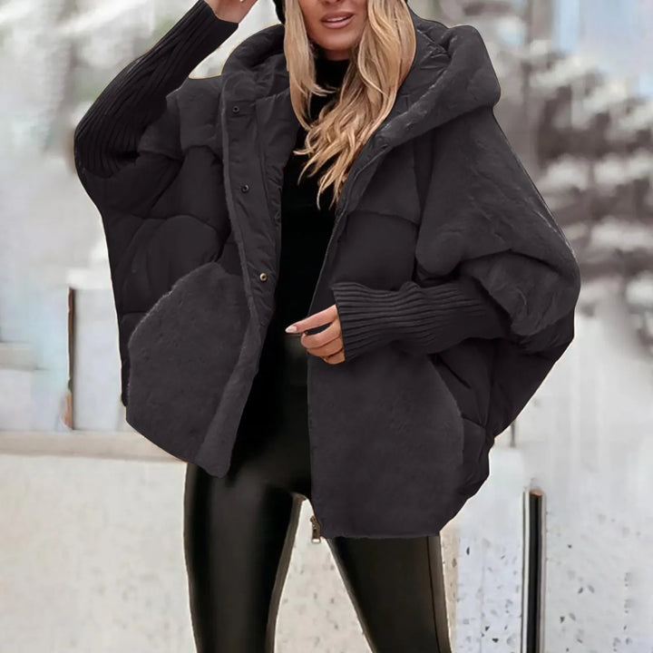 Vera Faux Fur Hooded Winter Parka, front view worn by model, showing ribbed cuffs and faux fur pockets, alternate angle