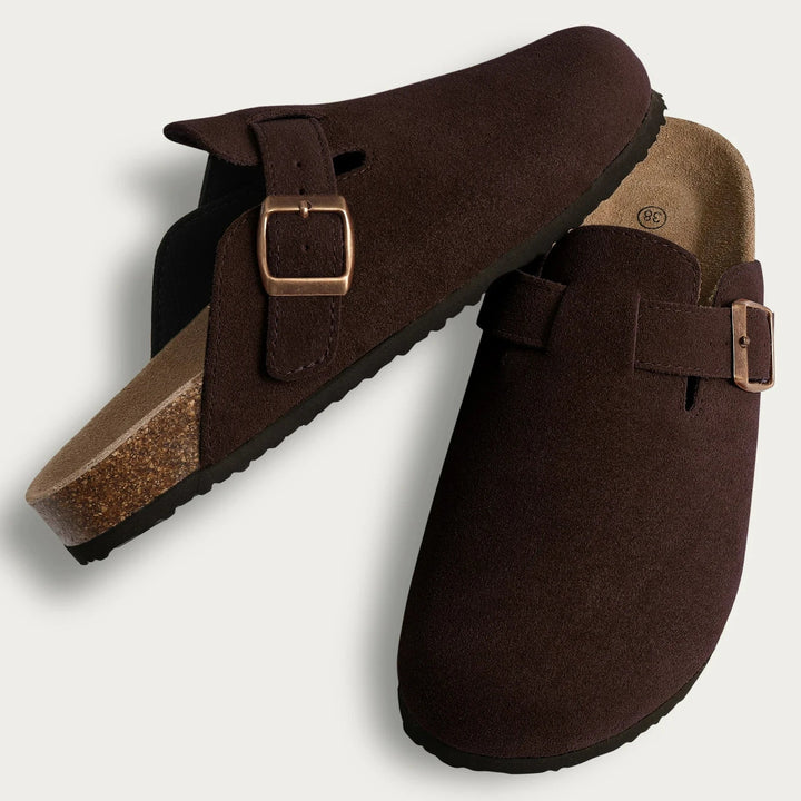 Pair of dark brown Aaron slip-on sandals, adjustable bronze buckles, cork soles, flat lay
