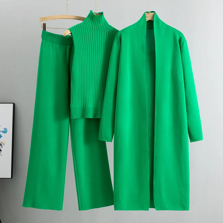 Flat lay of the green Ruby 3-piece knitted cardigan set with long cardigan, ribbed top, and wide leg pants