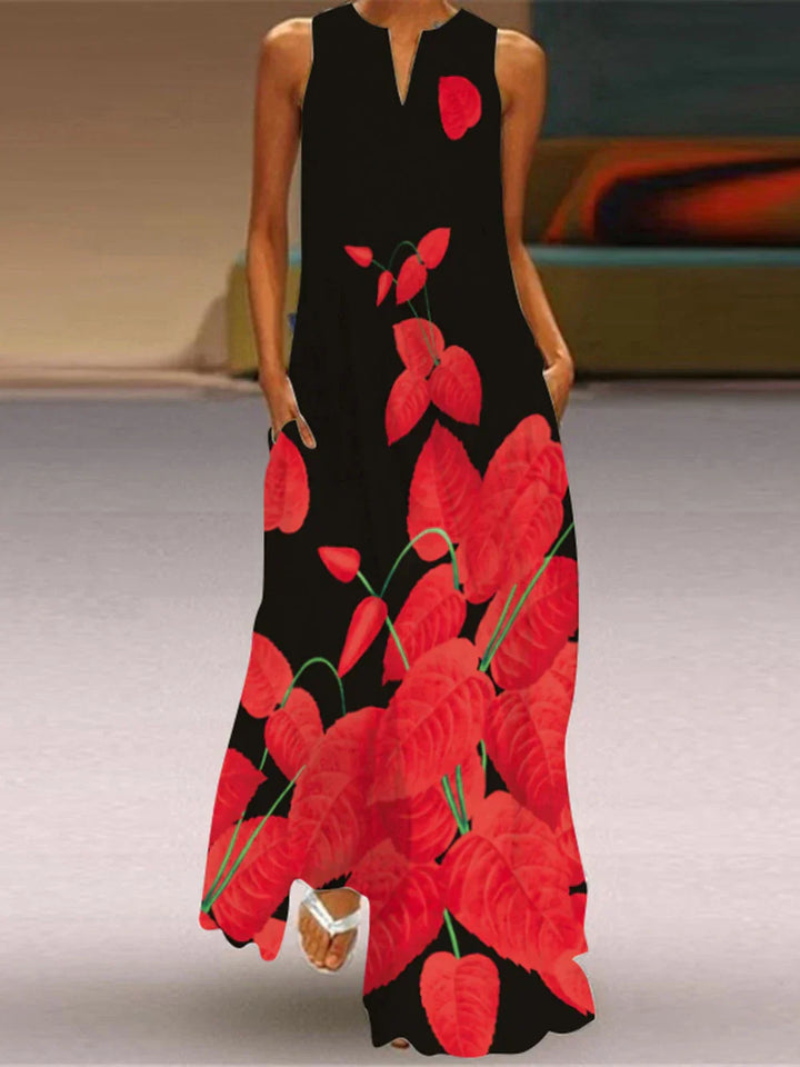 Black A line dress with a vibrant red floral print, front view