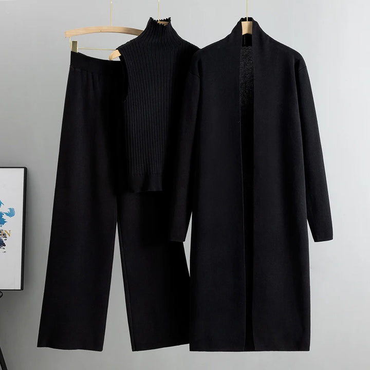 Front view of the black Ruby 3-piece knitted cardigan set with long cardigan, ribbed top, and wide leg pants