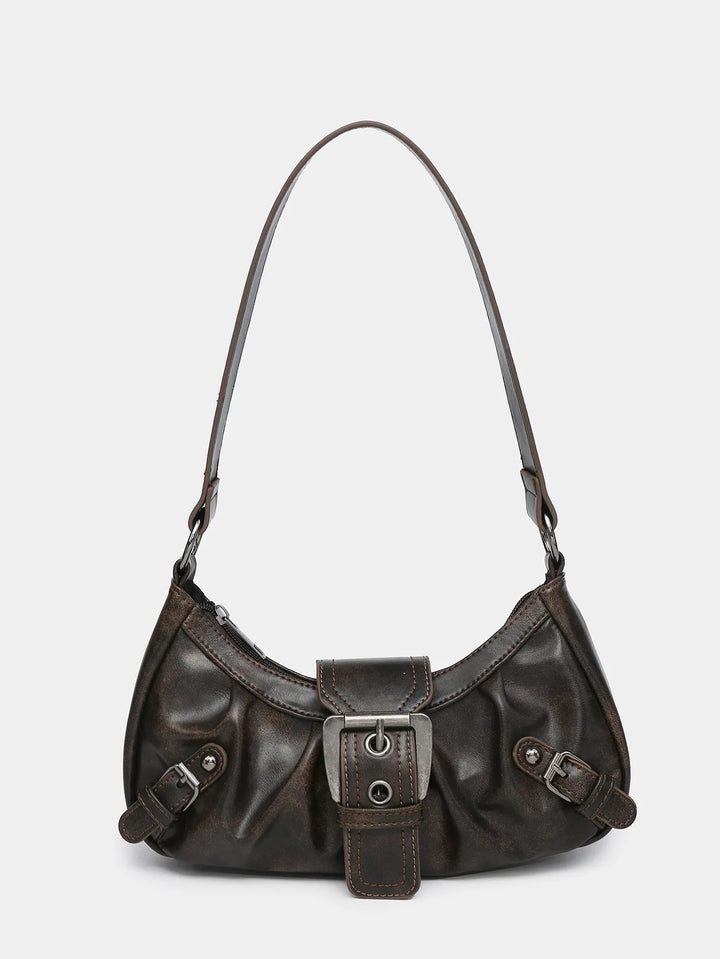 Front view of the Nola Retro Y2K Shoulder Bag, a dark brown faux leather handbag with buckle details