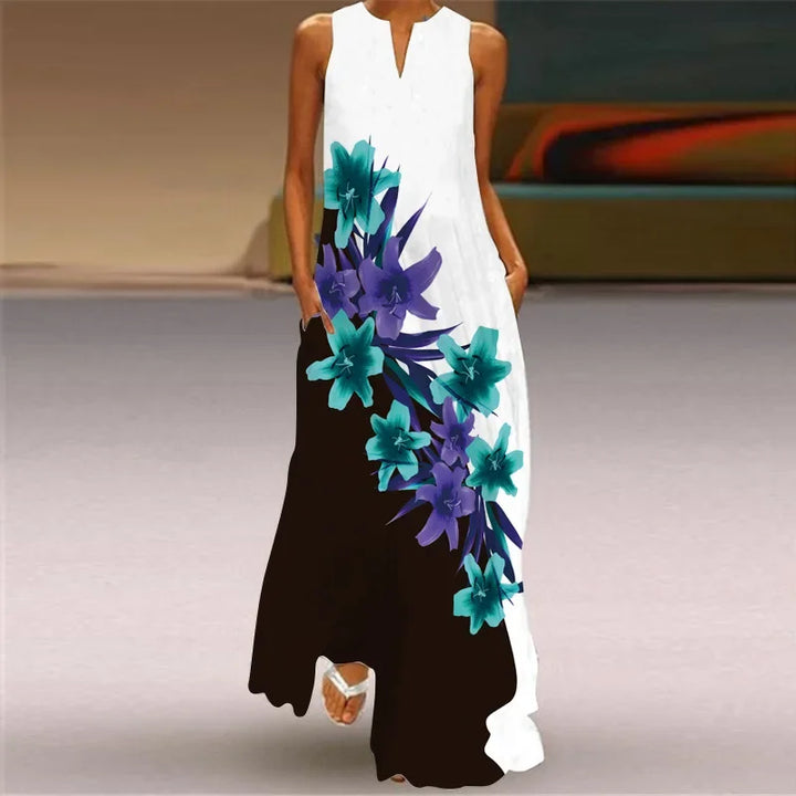 Front view worn by model, Butterfly Bloom A-Line Dress with a white top, black skirt and blue floral print
