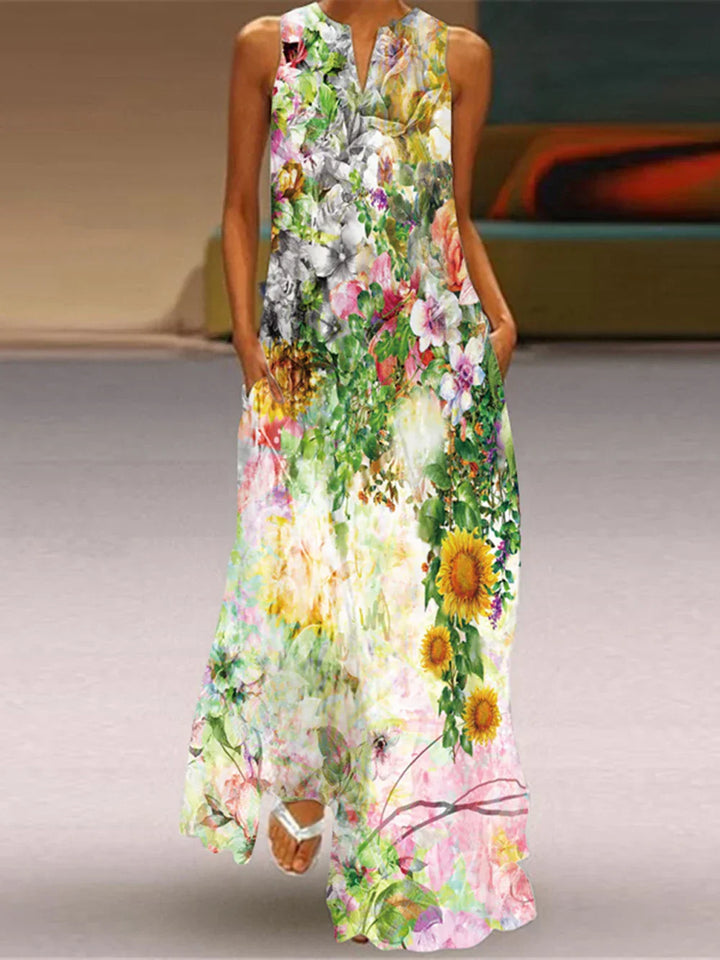 Front view worn by model, Butterfly Bloom A-Line Dress with a vibrant sunflower and wildflower print