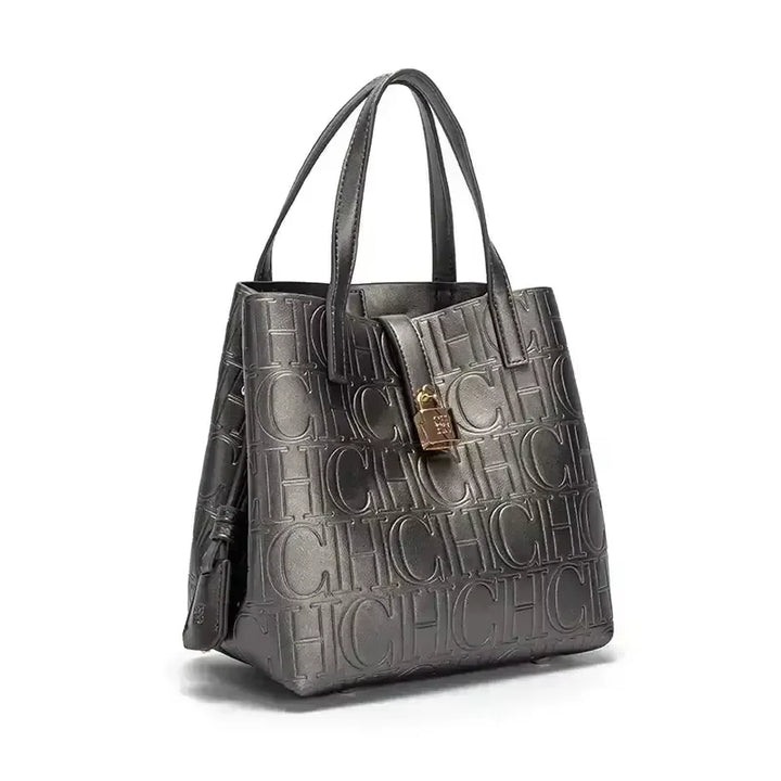 Dark grey large bucket handbag with an embossed pattern, side view
